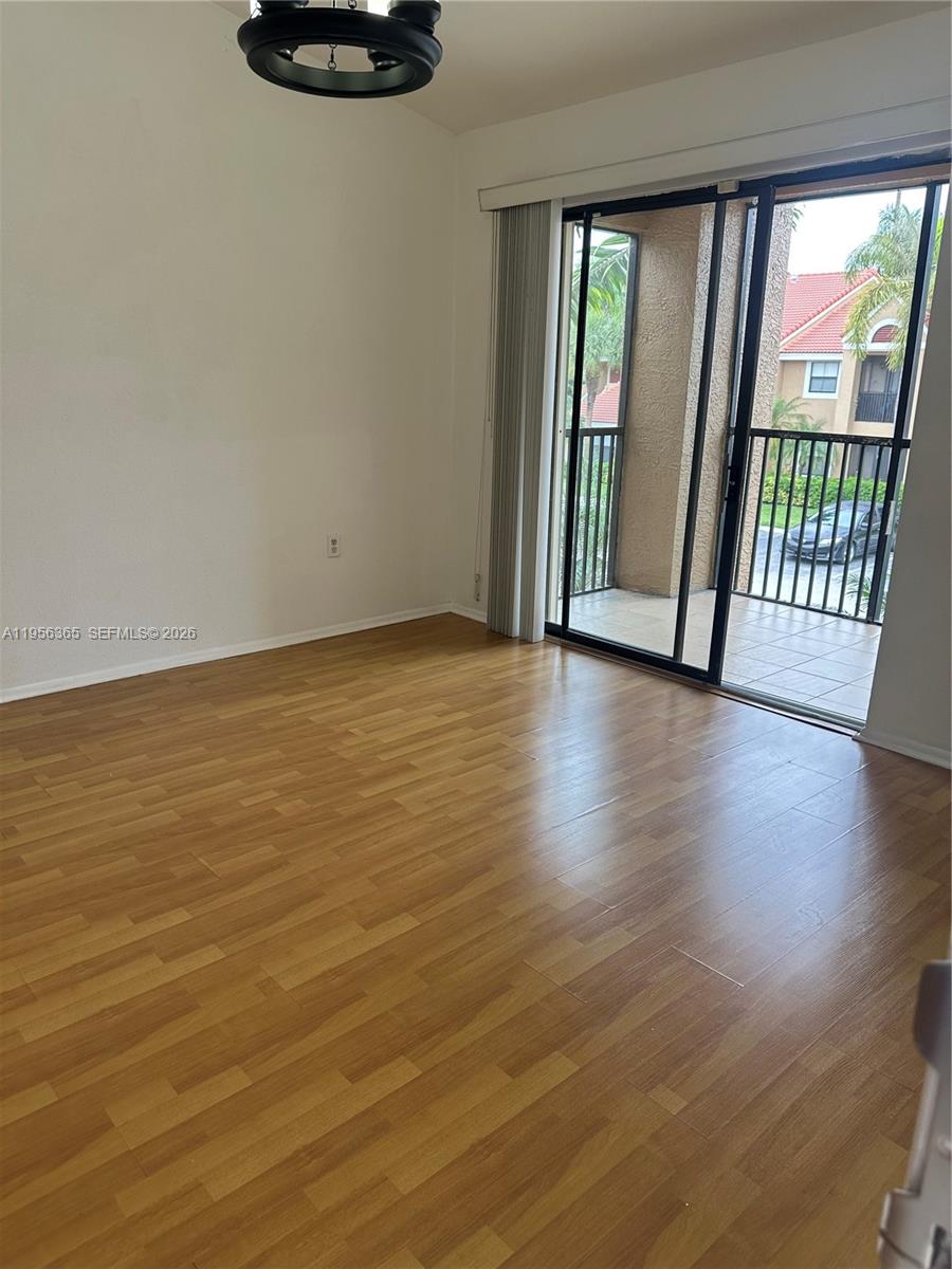 15560 Southwest 104th Terrace, Unit 625 Miami, FL 33196 - Photo 6 of 14 a view of an ocean & mountain view from a big room