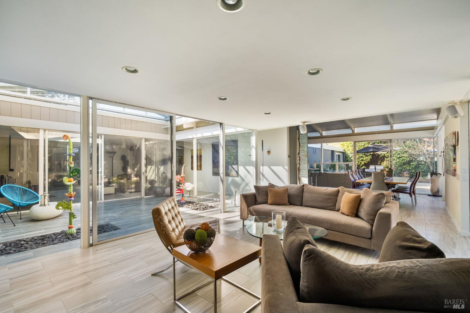 43 La Crescenta Way San Rafael, CA 94901 - Photo 11 of 28 a living room with furniture and a large window
