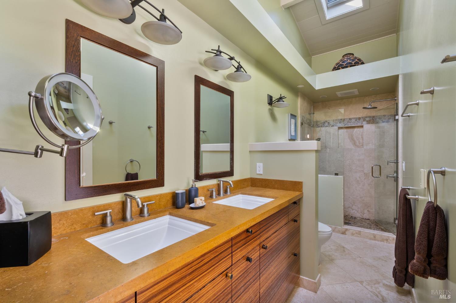 43 La Crescenta Way San Rafael, CA 94901 - Photo 19 of 28 a bathroom with a sink double vanity and a mirror