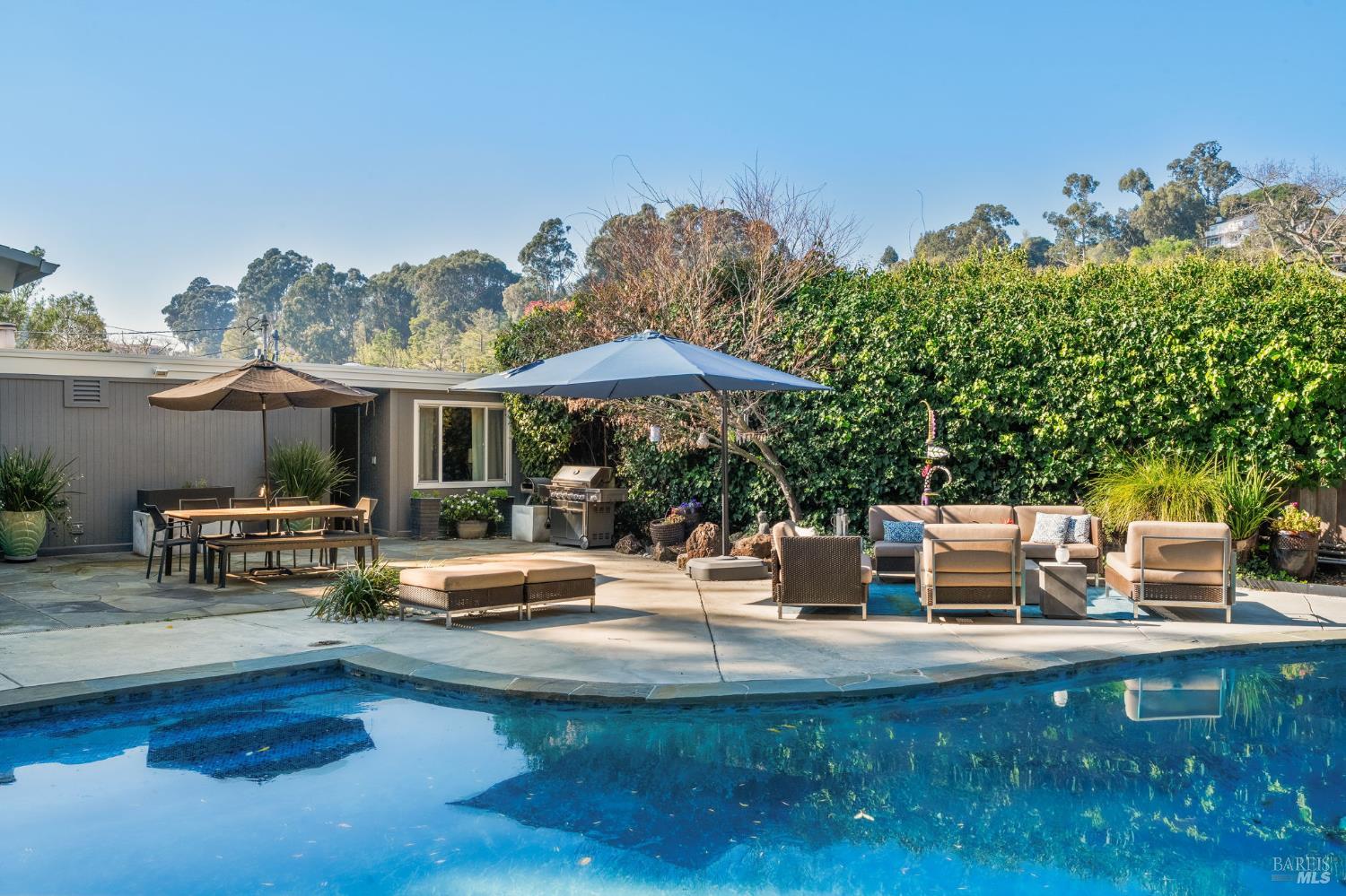 43 La Crescenta Way San Rafael, CA 94901 - Photo 27 of 28 a building outdoor space with patio furniture