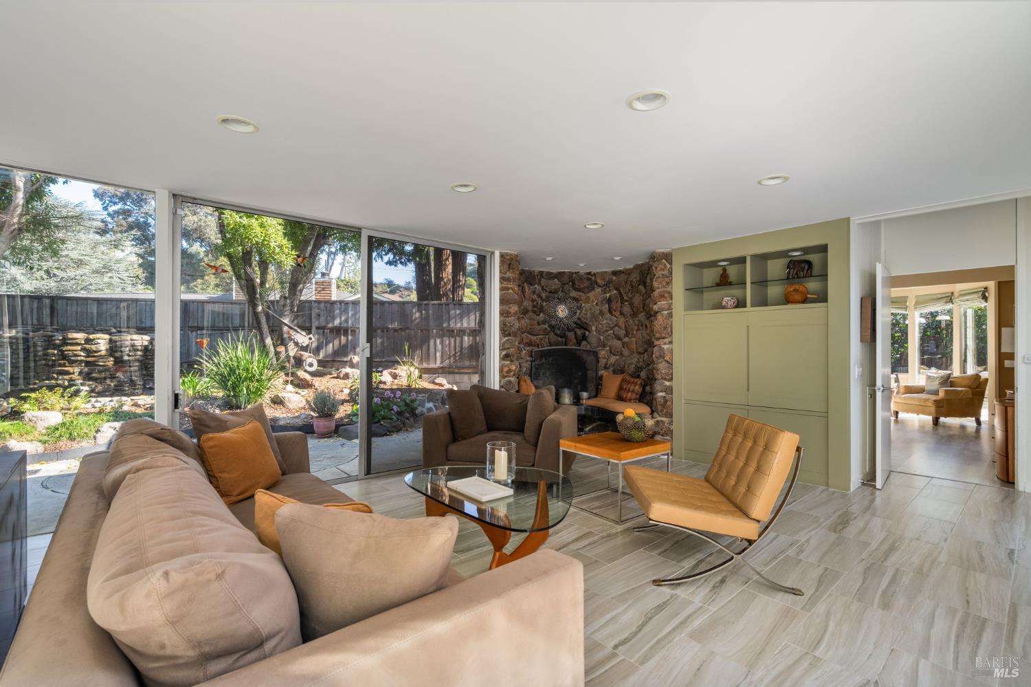 43 La Crescenta Way San Rafael, CA 94901 - Photo 8 of 28 a living room with furniture and a large window