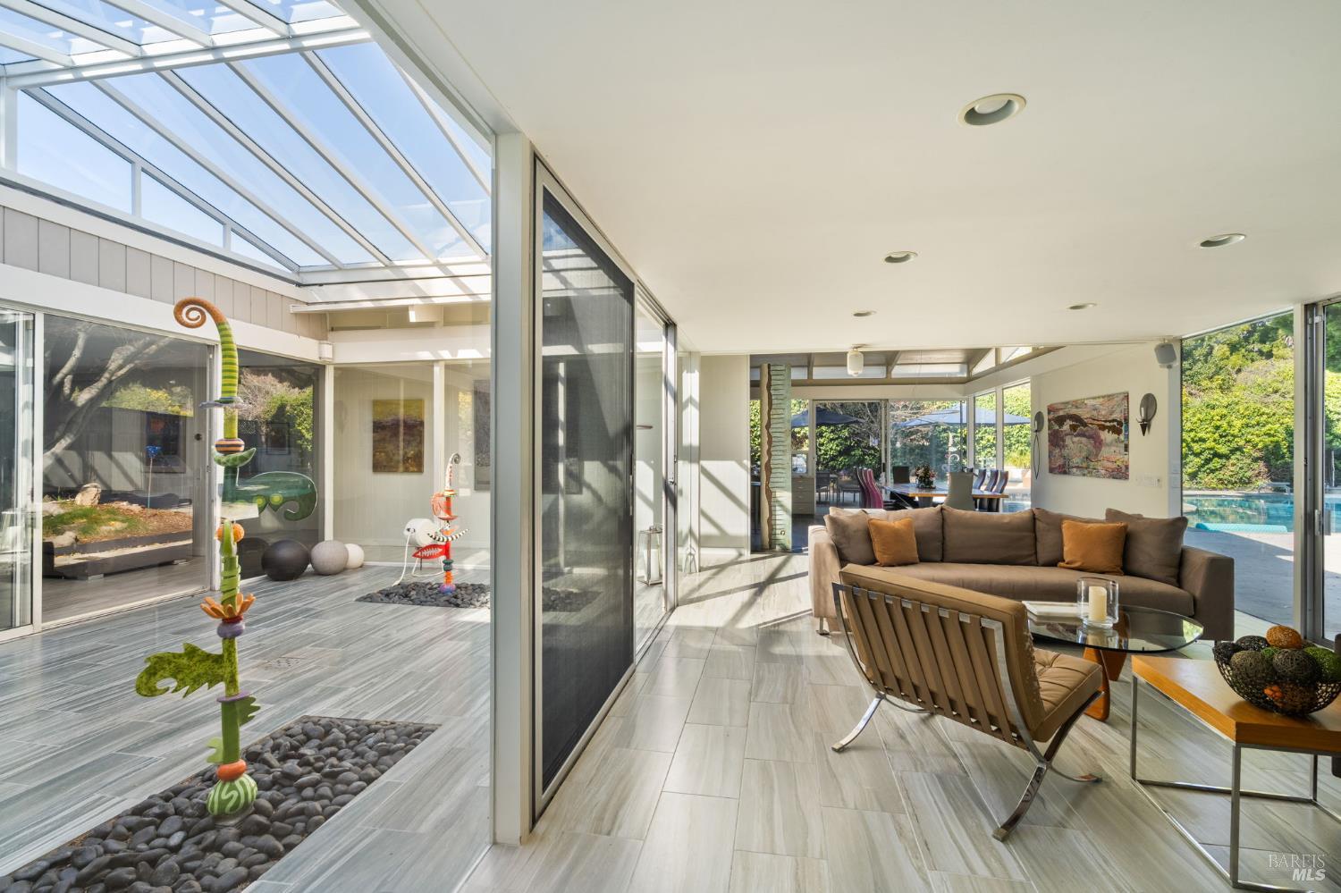 43 La Crescenta Way San Rafael, CA 94901 - Photo 10 of 28 a balcony with furniture and a potted plant