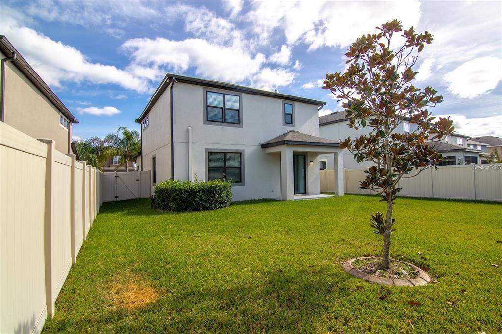 1977 Nature View Drive Lutz, FL 33558 - Photo 18 of 18 a house view with a garden space