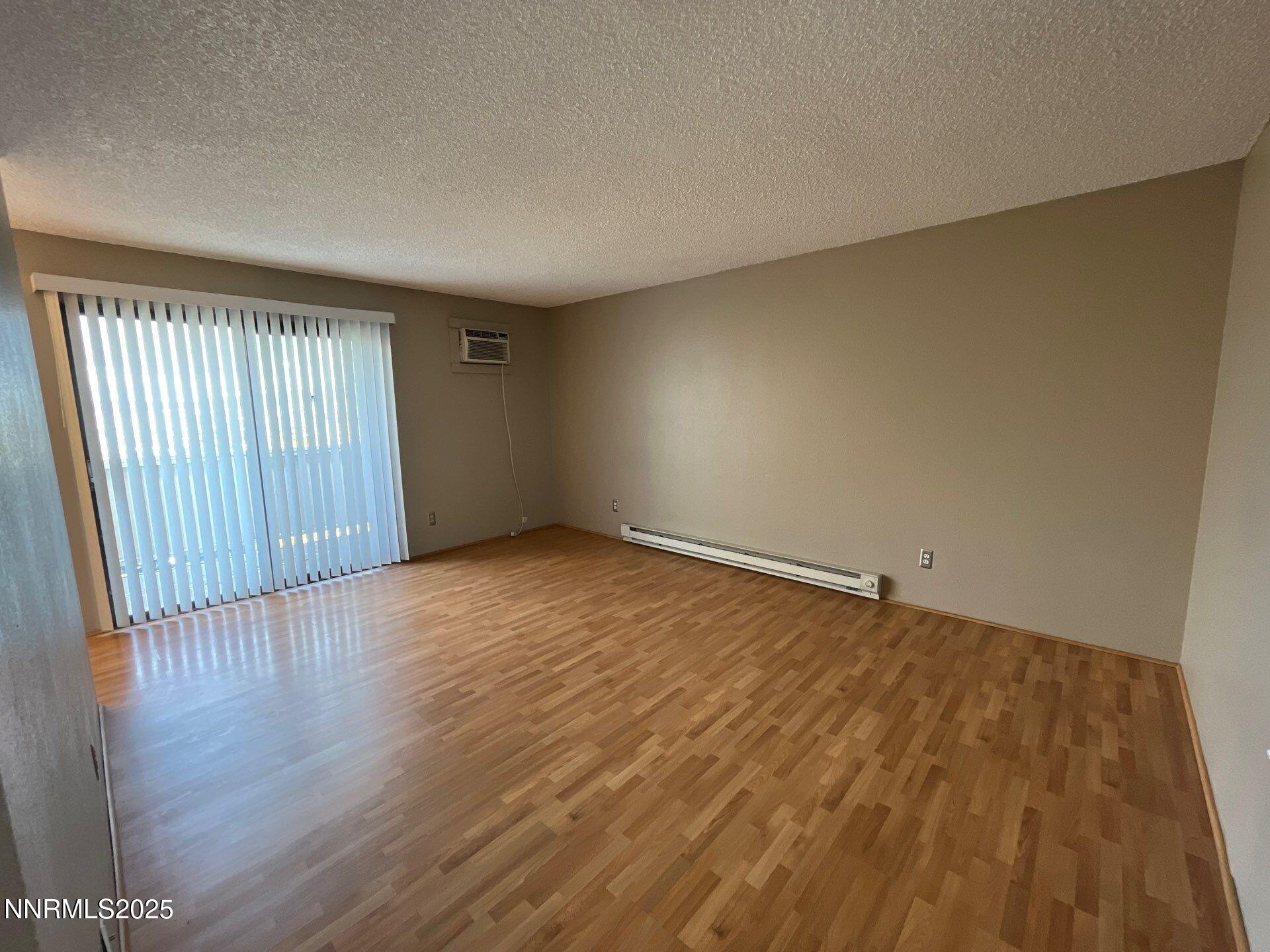 3885 East Leonesio Drive, Unit A2 Reno, NV 89512 - Photo 2 of 12 Leonesio living room
