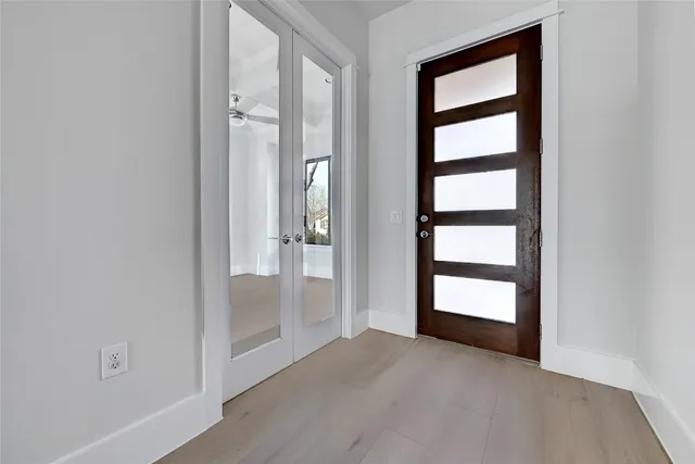 a view of empty room with front door