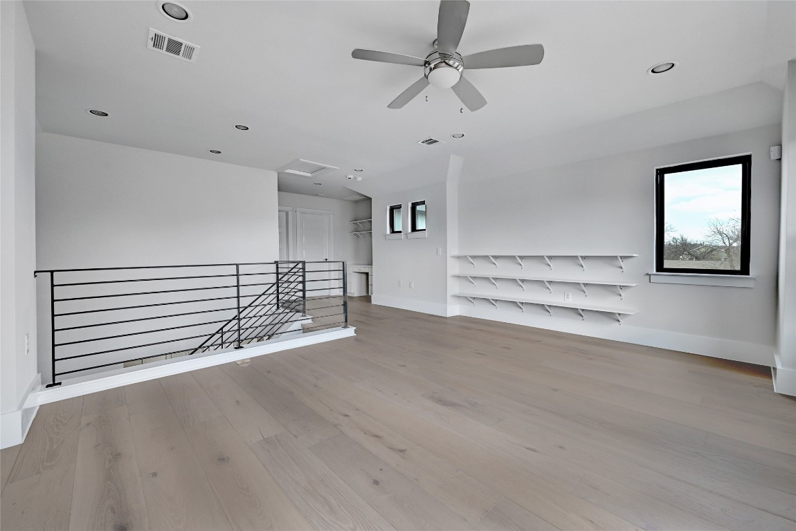 1815 West 38th Street Austin, TX 78731 - Photo 18 of 25 an empty room with a empty space and windows