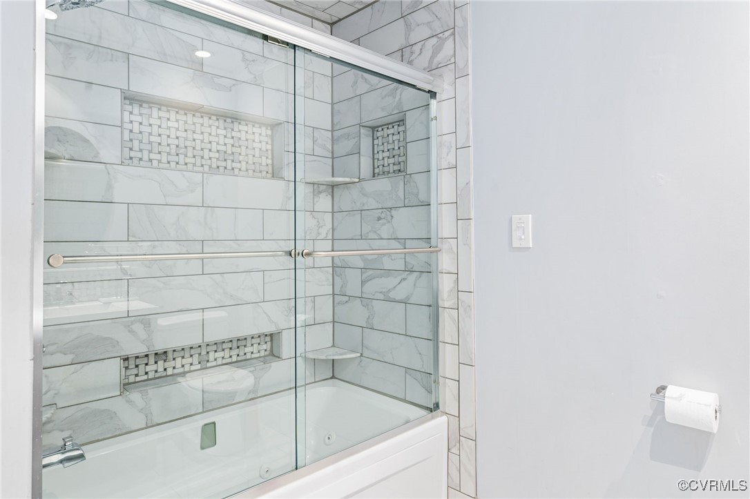 119 Monath Road Richmond, VA 23236 - Photo 17 of 48 a bathroom with a bathtub