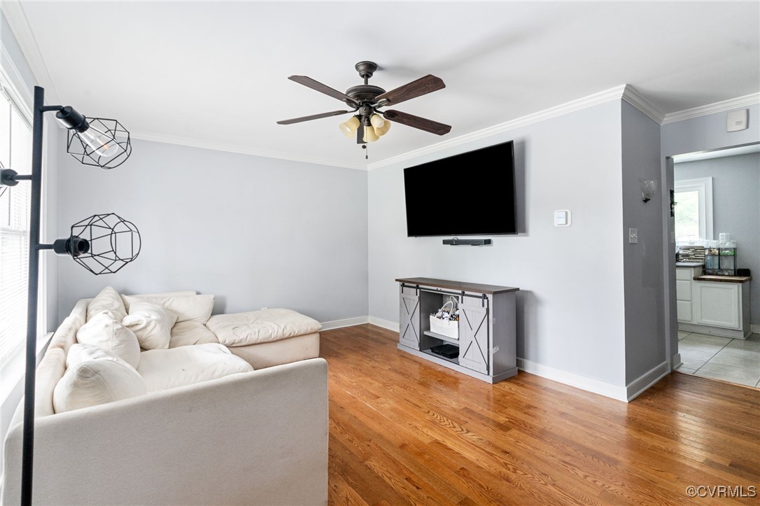 119 Monath Road Richmond, VA 23236 - Photo 3 of 48 a living room with furniture and a flat screen tv