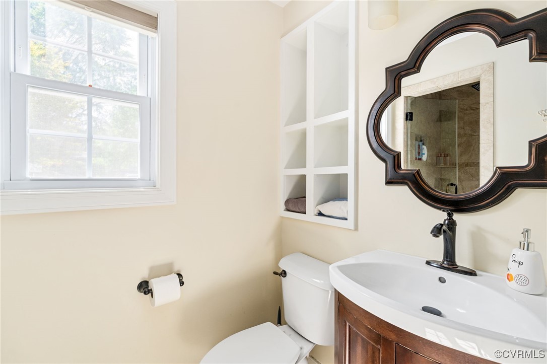 119 Monath Road Richmond, VA 23236 - Photo 31 of 48 a bathroom with a sink and a mirror
