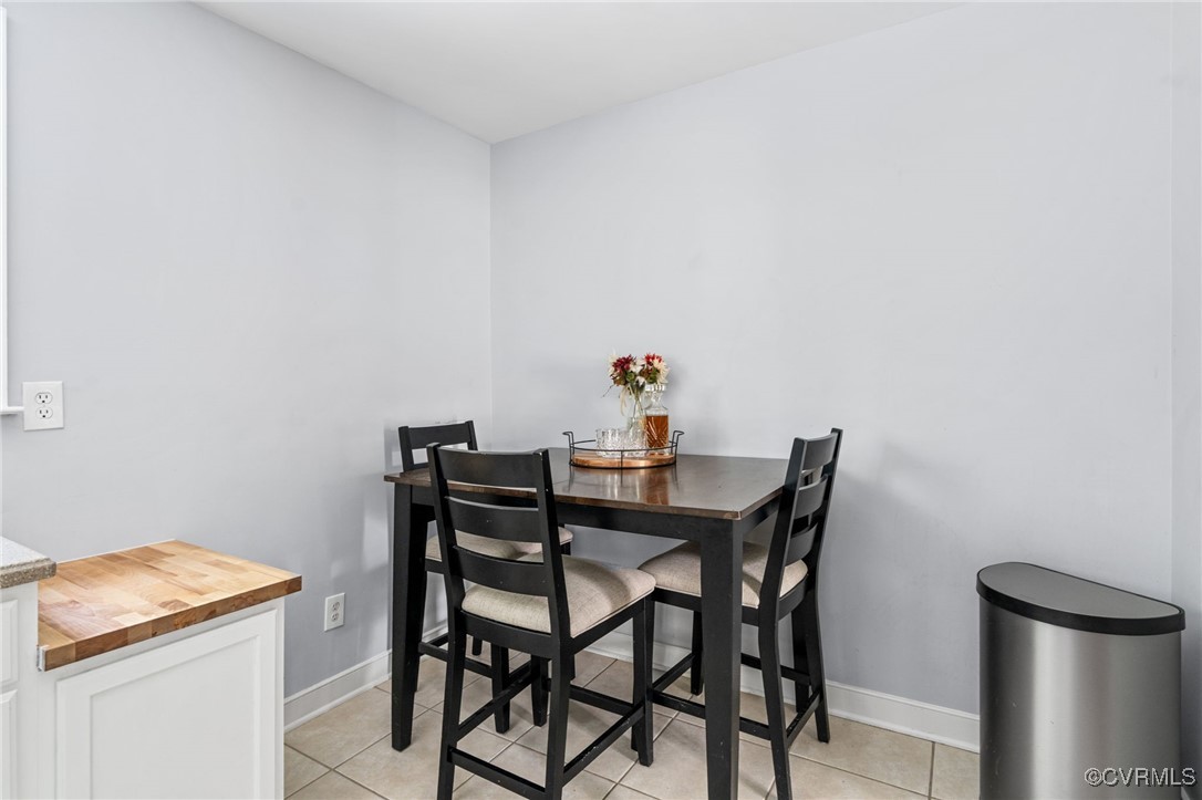 119 Monath Road Richmond, VA 23236 - Photo 10 of 48 a view of a dining room with furniture and wooden floor