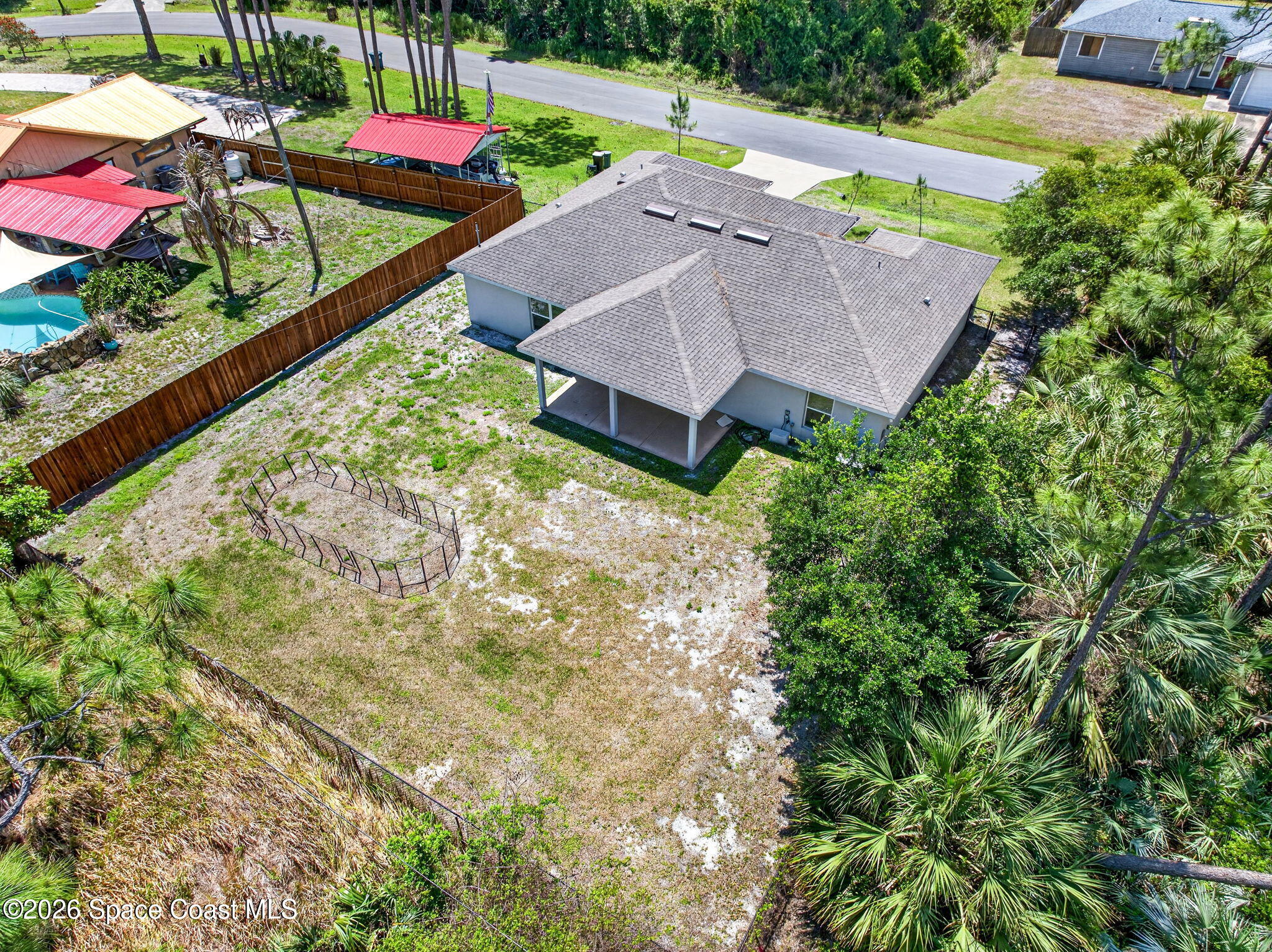 717 Gelaso Street Southwest Palm Bay, FL 32908 - Photo 2 of 48 an aerial view of a house