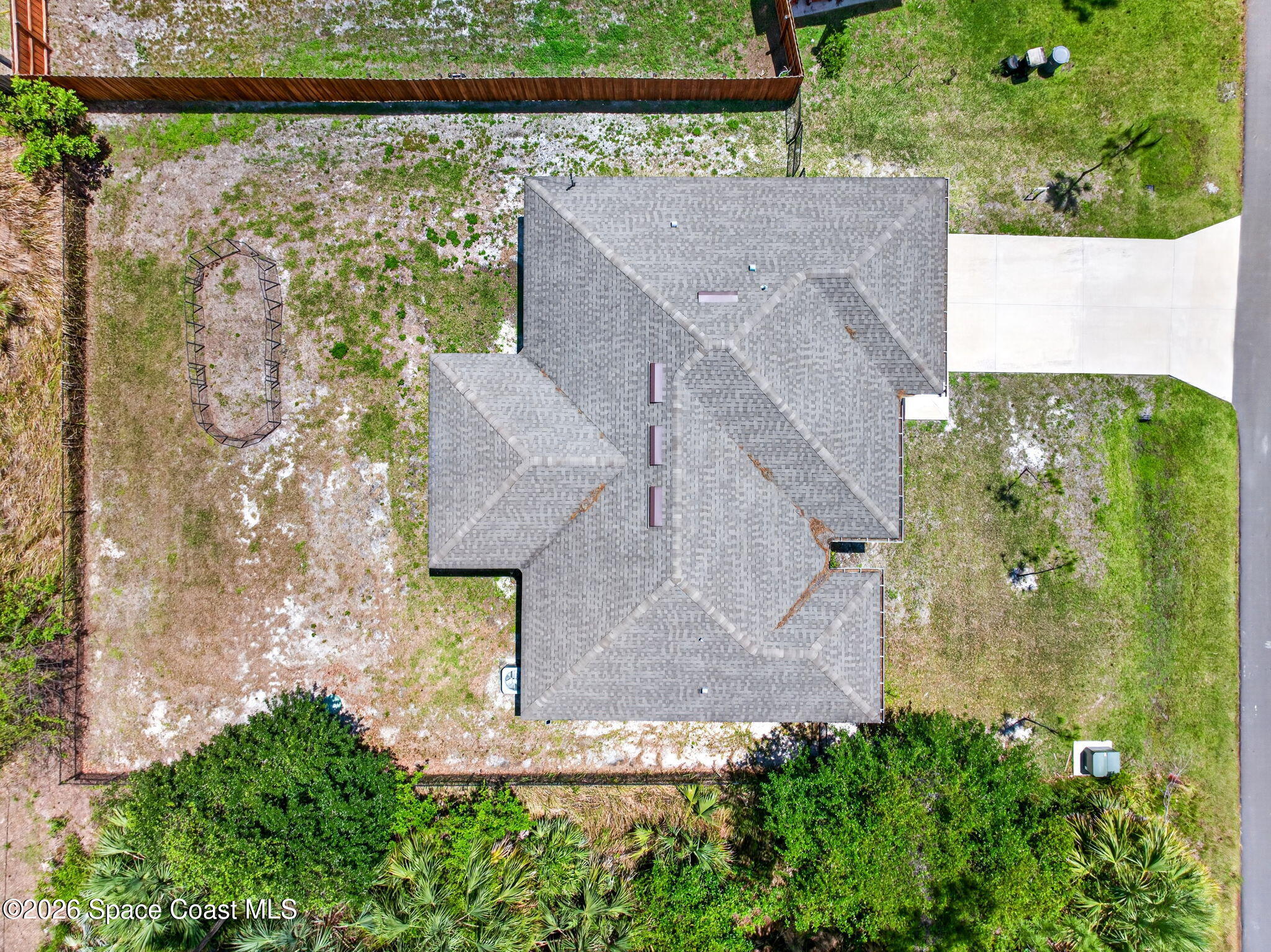 717 Gelaso Street Southwest Palm Bay, FL 32908 - Photo 3 of 48 an aerial view of a house with a yard