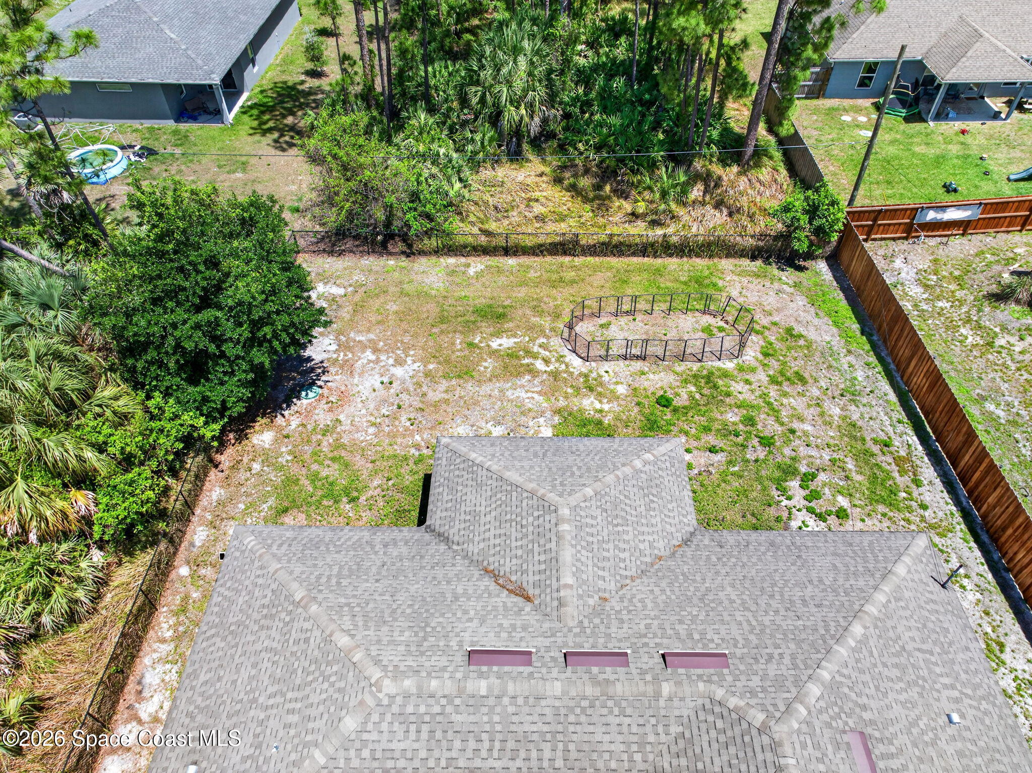 717 Gelaso Street Southwest Palm Bay, FL 32908 - Photo 40 of 48 a view of swimming pool with a yard