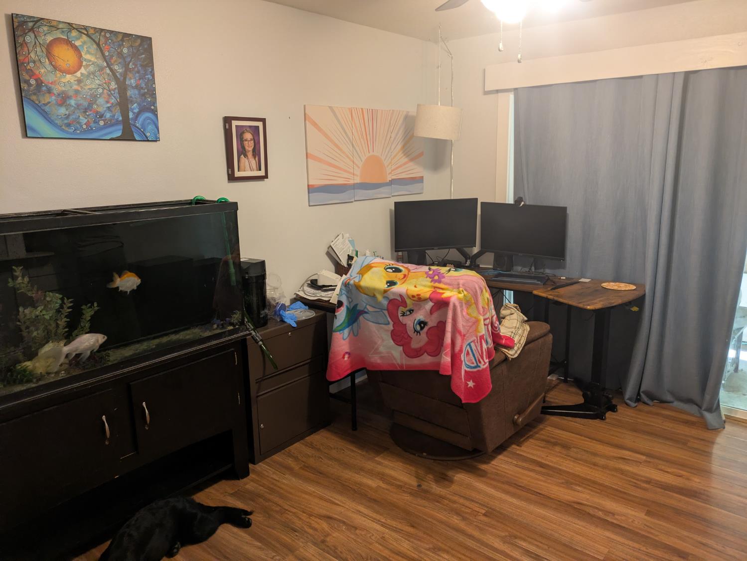 25931 Thornton Road Thornton, CA 95686 - Photo 22 of 31 a bedroom with a bed and wooden floor