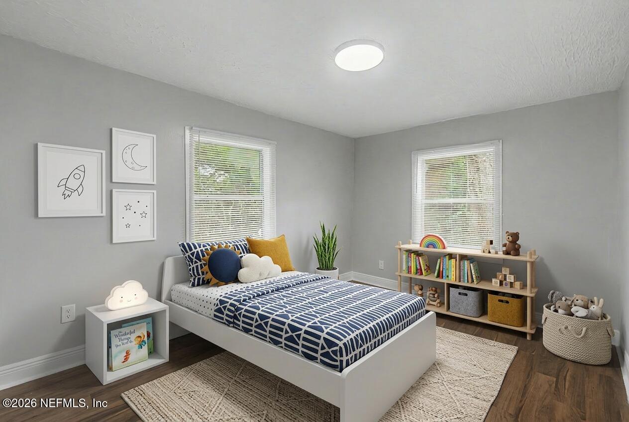 2625 Kohn Road Jacksonville, FL 32210 - Photo 19 of 34 a bed room with a bed and a window
