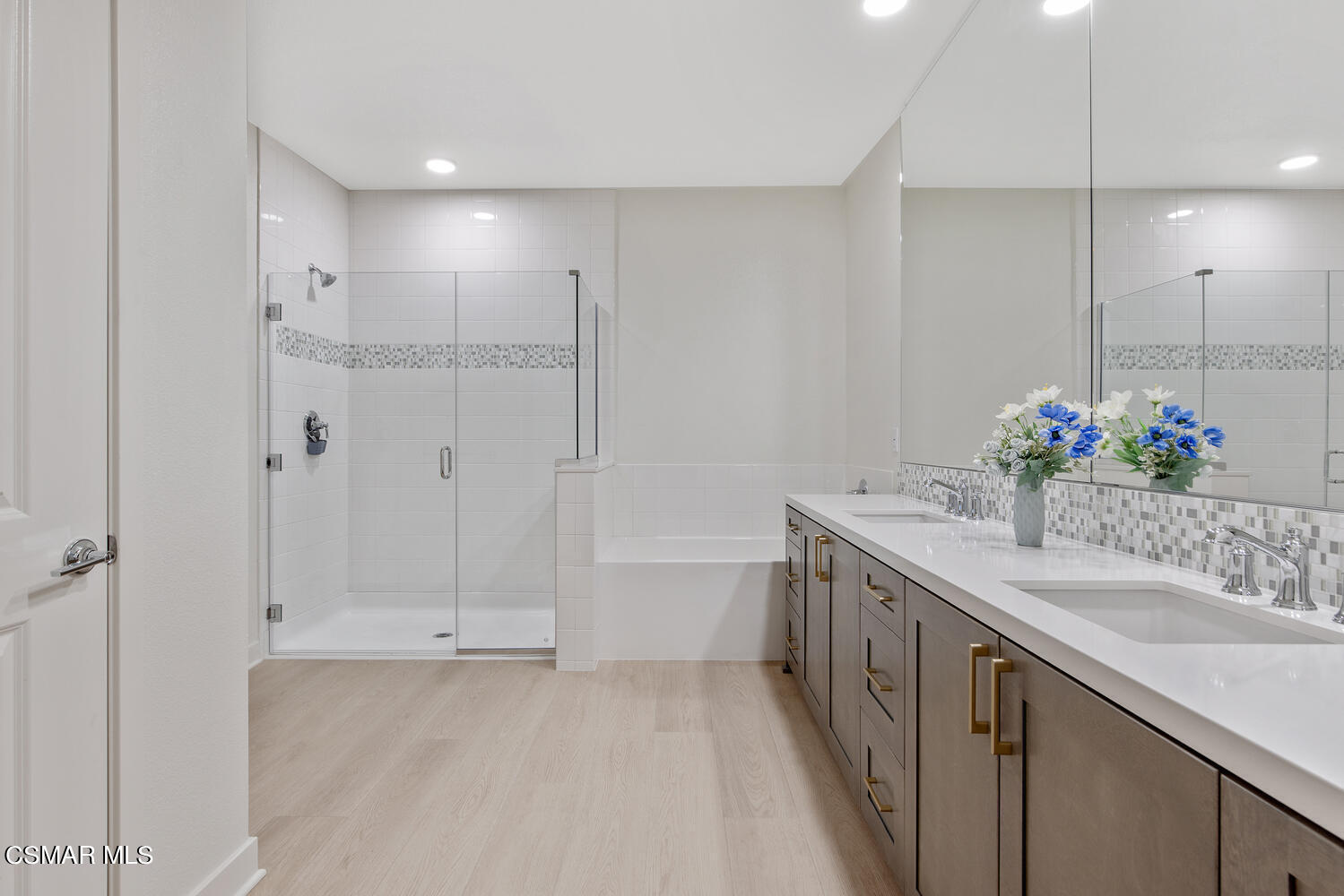 2850 Wagon Wheel Road, Unit 303 Oxnard, CA 93036 - Photo 20 of 42 a bathroom with a double vanity sink mirror and shower