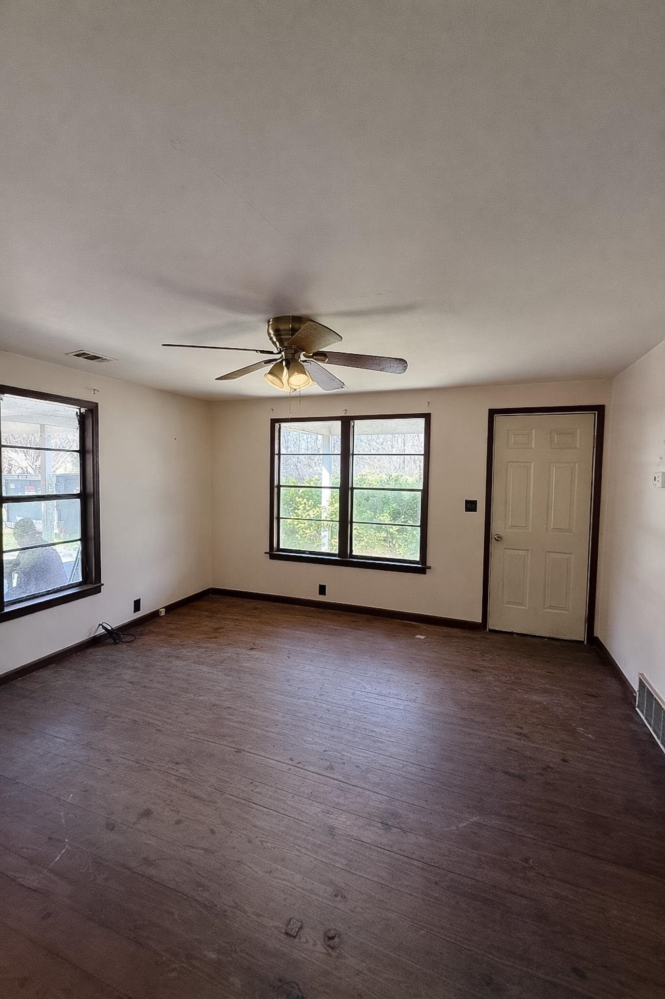 7394 Benjestown Road Millington, TN 38053 - Photo 5 of 6 Unfurnished room featuring a ceiling fan and dark wood-type flooring