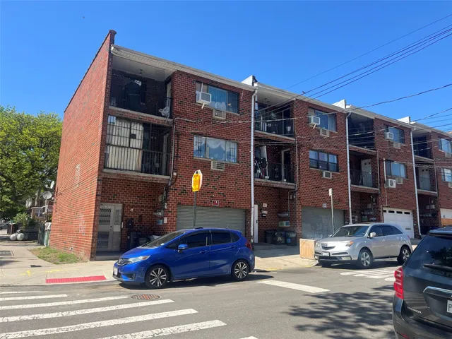 a car parked in front of a building
