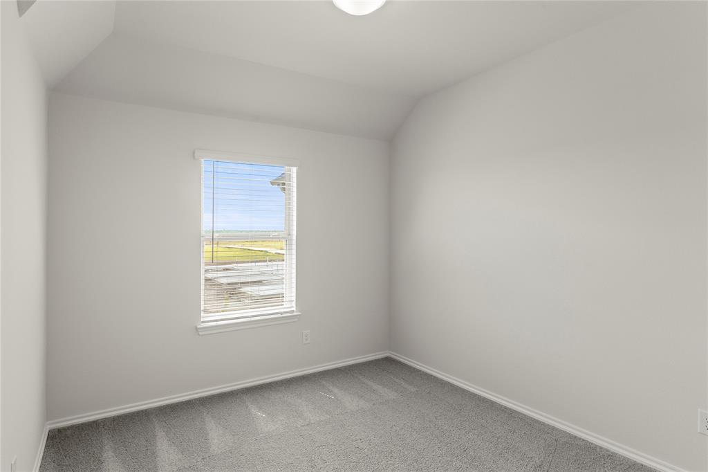 5414 East Runnel Road Royse City, TX 75189 - Photo 14 of 26 an empty room with a window
