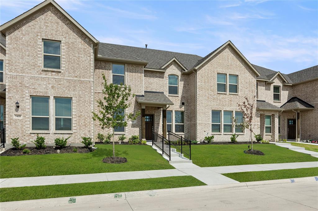 5414 East Runnel Road Royse City, TX 75189 - Photo 2 of 26 a front view of a house with a yard