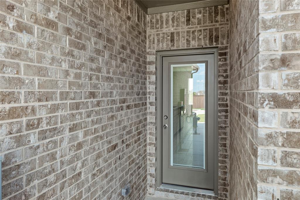 5414 East Runnel Road Royse City, TX 75189 - Photo 24 of 26 a bathroom with a shower and a mirror