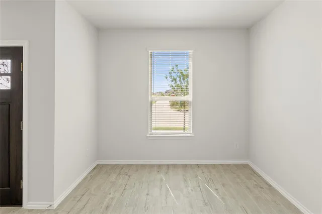 an empty room with a window