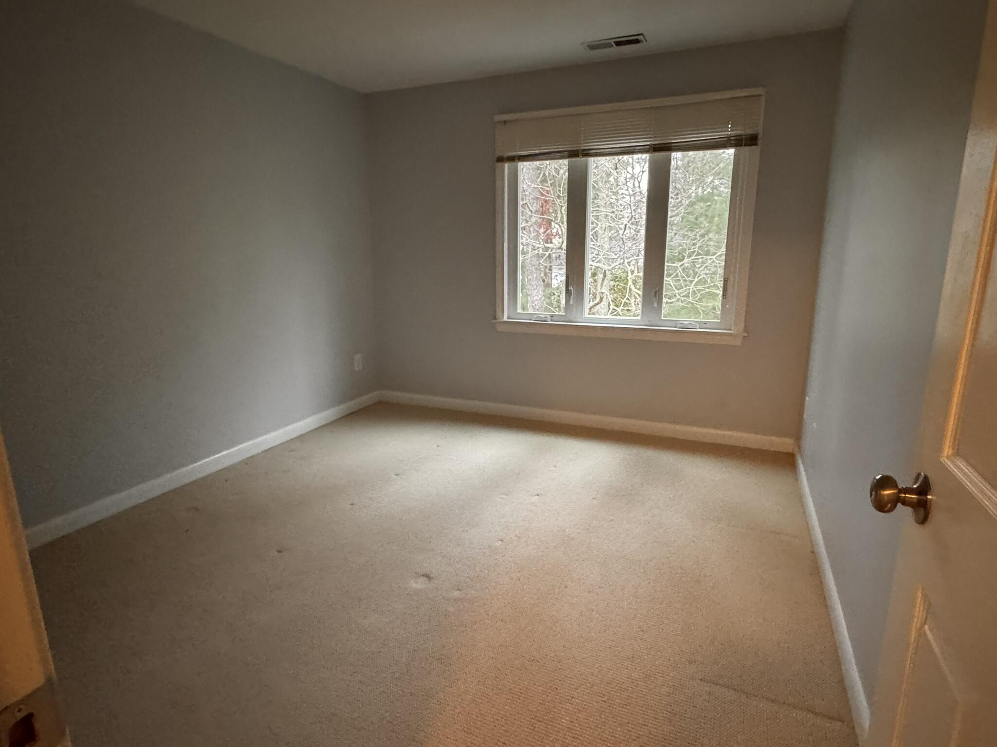 225 SW Meadows, Unit 225 Teaticket, MA 02536 - Photo 12 of 20 an empty room with a window