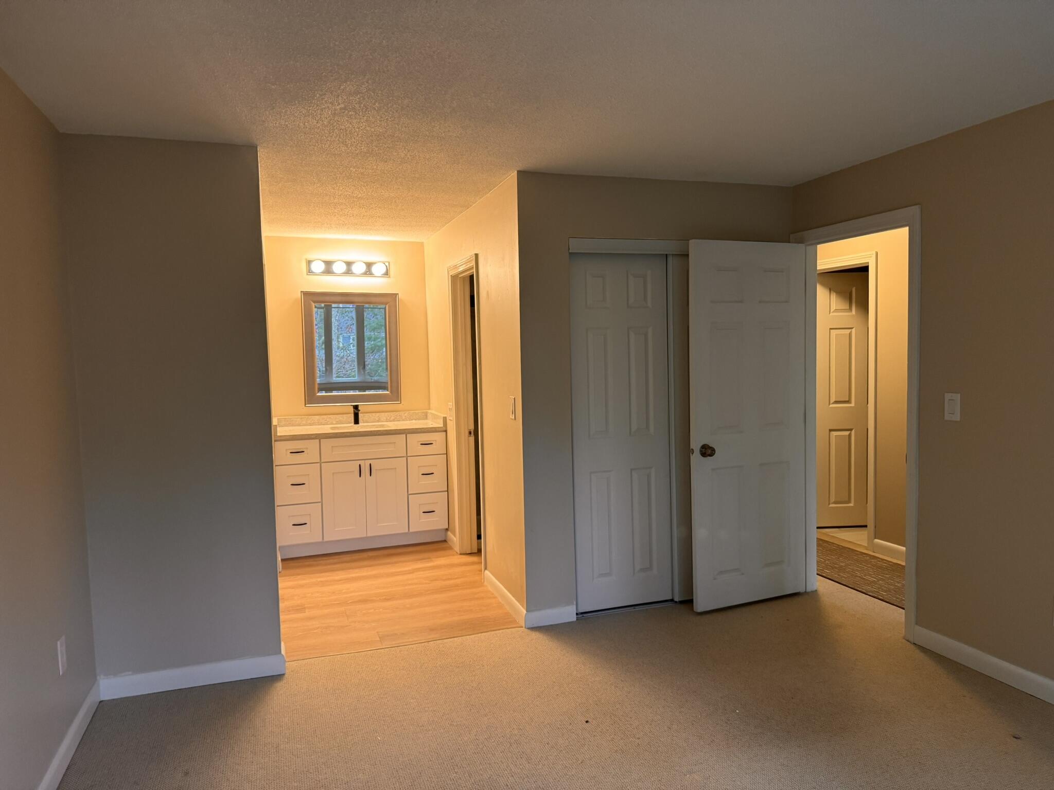 225 SW Meadows, Unit 225 Teaticket, MA 02536 - Photo 13 of 20 an empty room with a bathroom and sink