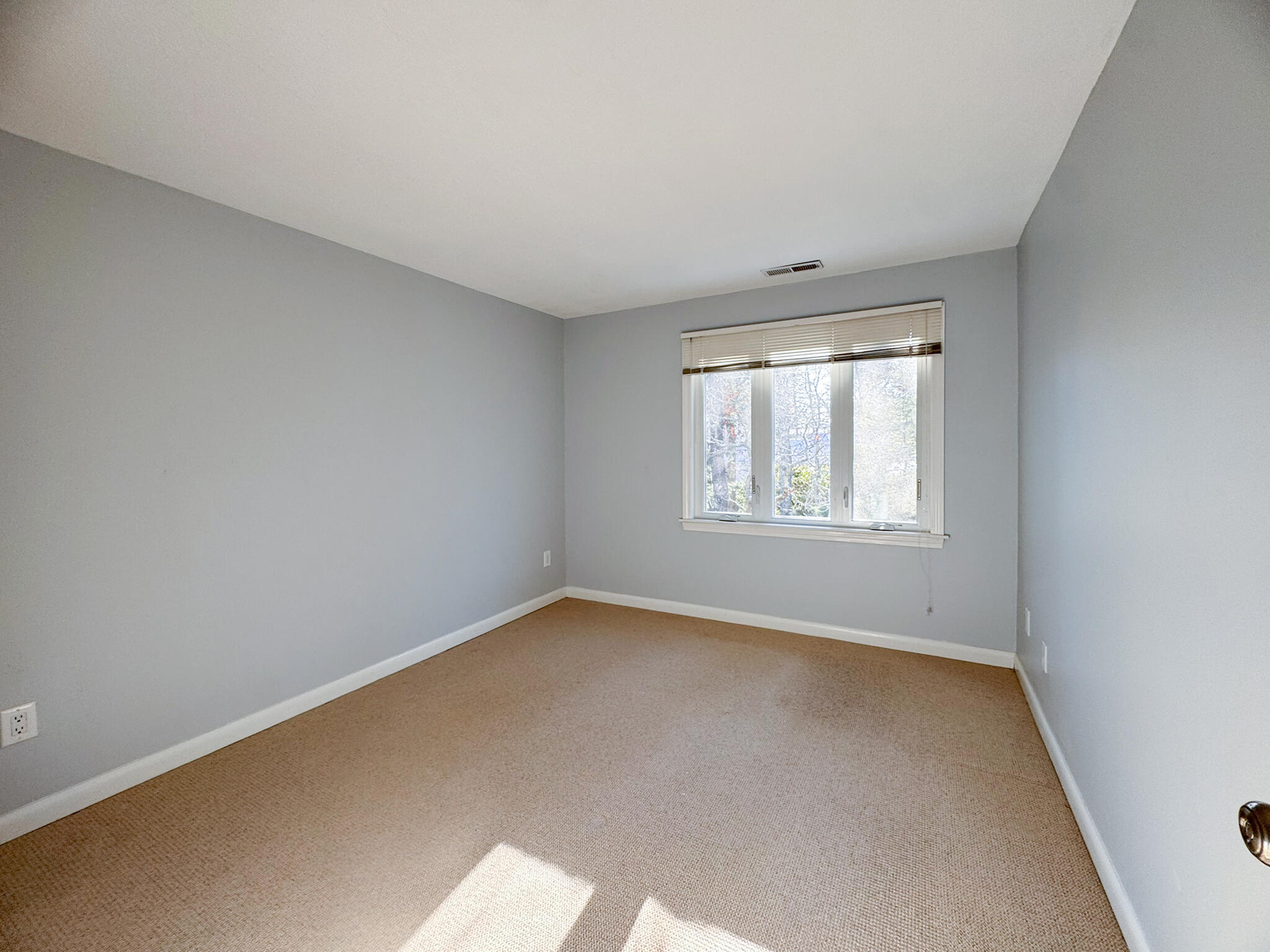 225 SW Meadows, Unit 225 Teaticket, MA 02536 - Photo 19 of 27 an empty room with a window