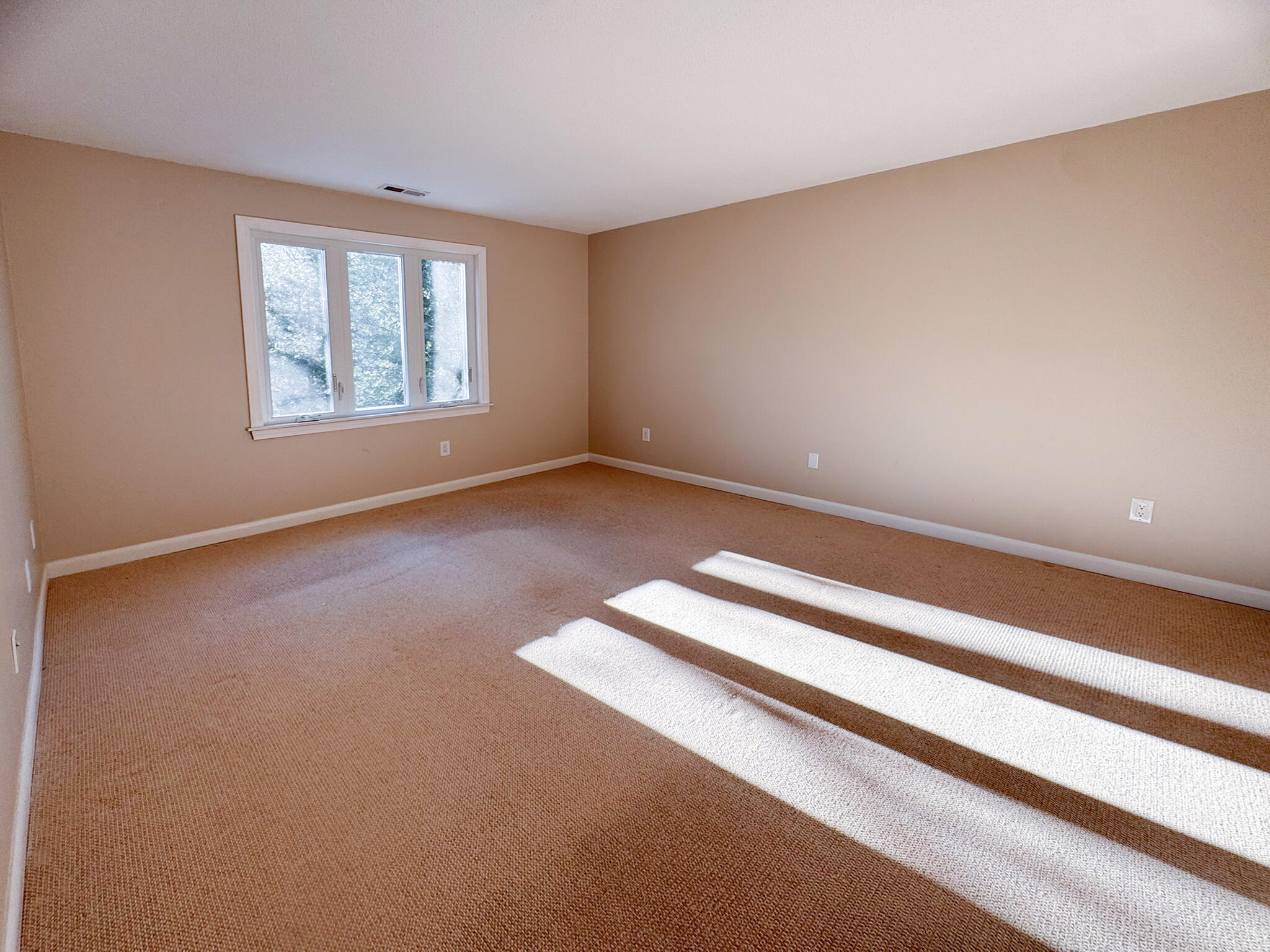 225 SW Meadows, Unit 225 Teaticket, MA 02536 - Photo 20 of 27 an empty room with windows