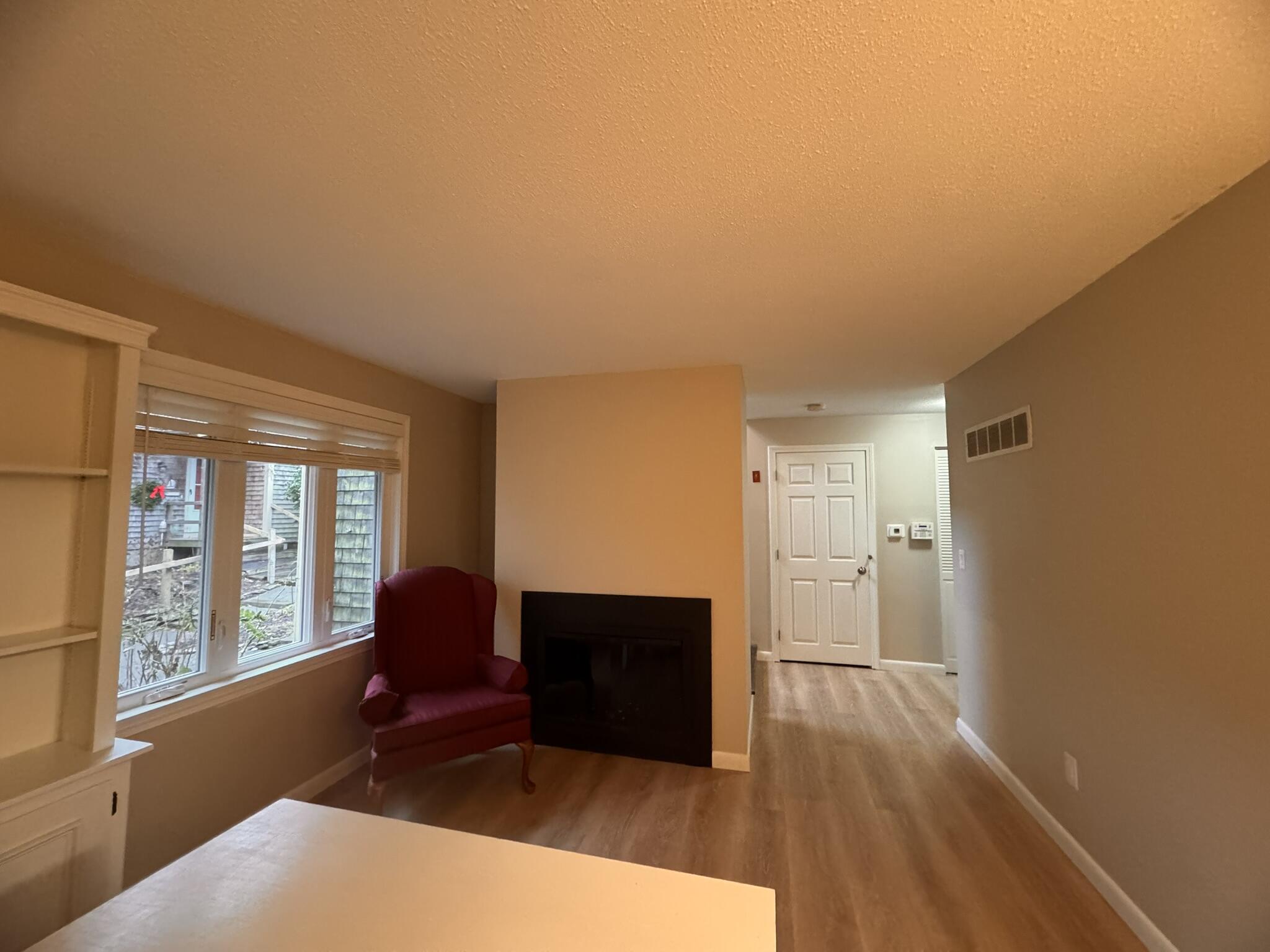 225 SW Meadows, Unit 225 Teaticket, MA 02536 - Photo 6 of 20 a living room with furniture and a large window