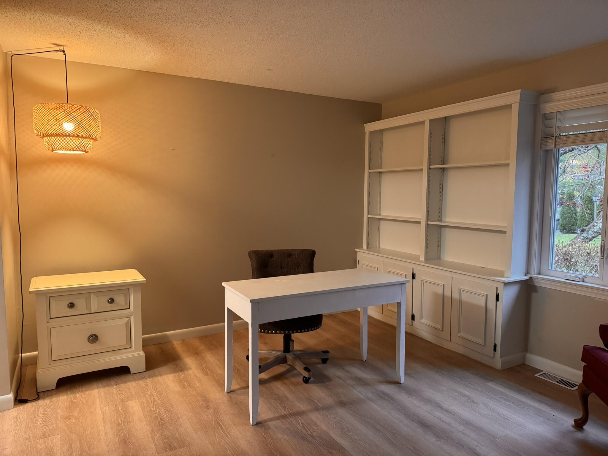 225 SW Meadows, Unit 225 Teaticket, MA 02536 - Photo 7 of 20 a view of a workspace with furniture and a window