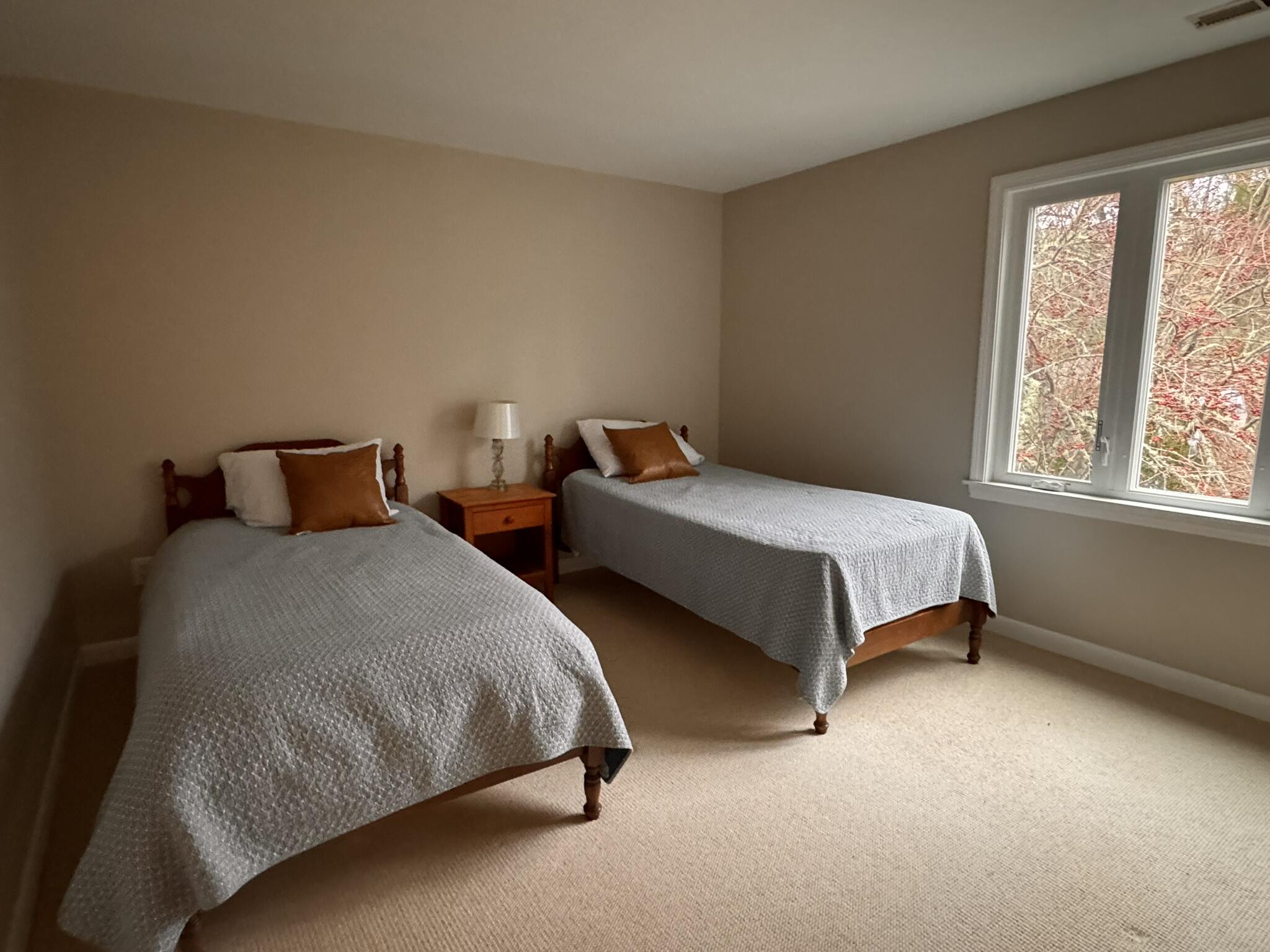 225 SW Meadows, Unit 225 Teaticket, MA 02536 - Photo 9 of 20 a bedroom with two bed and window