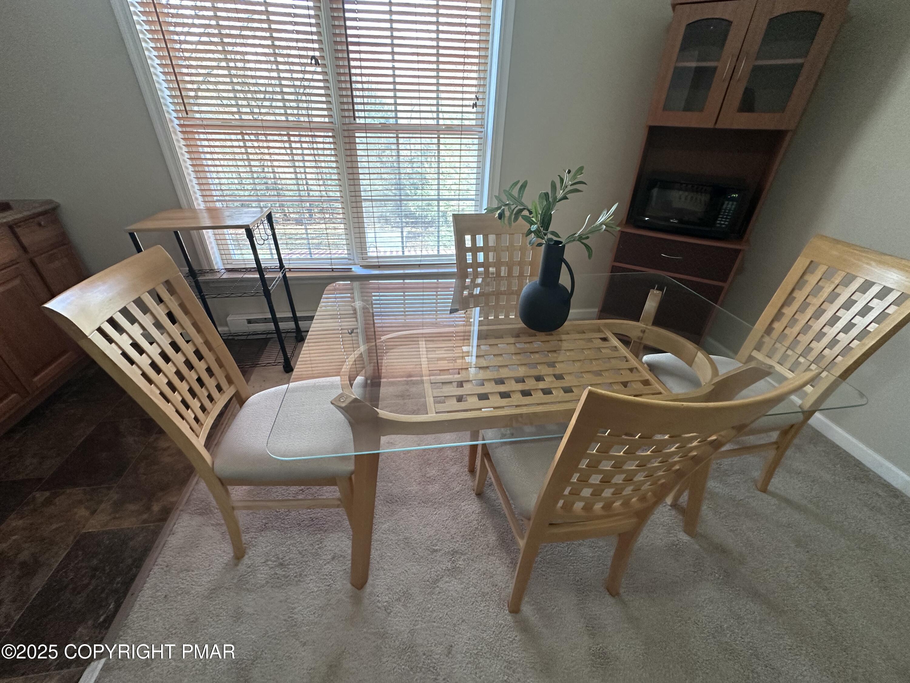 5158 Spring Drive Swiftwater, PA 18370 - Photo 5 of 26 a view of a dining room with furniture