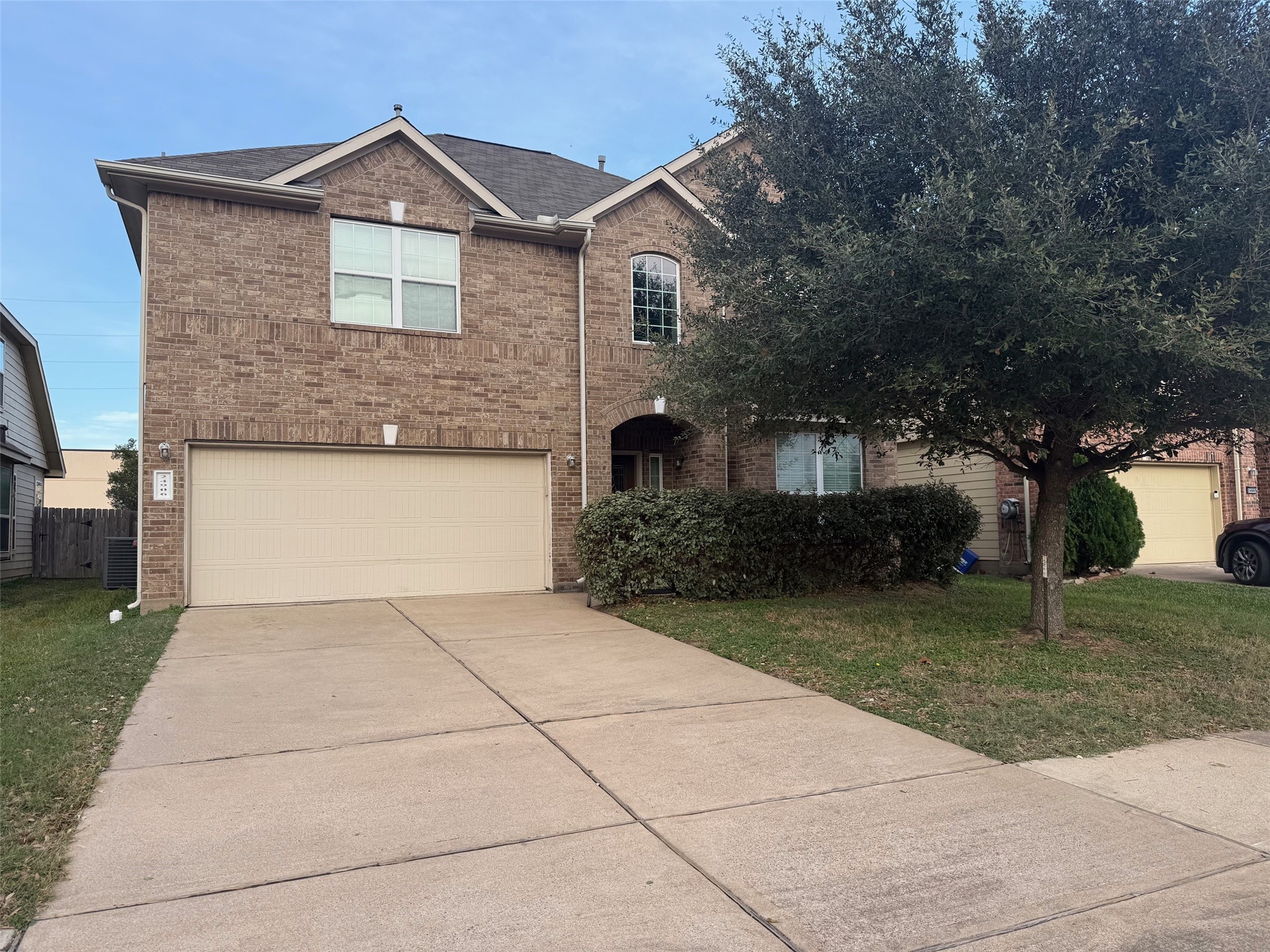 24906 Clover Ranch Drive Katy, TX 77494 - Photo 2 of 13 a front view of a house with garden