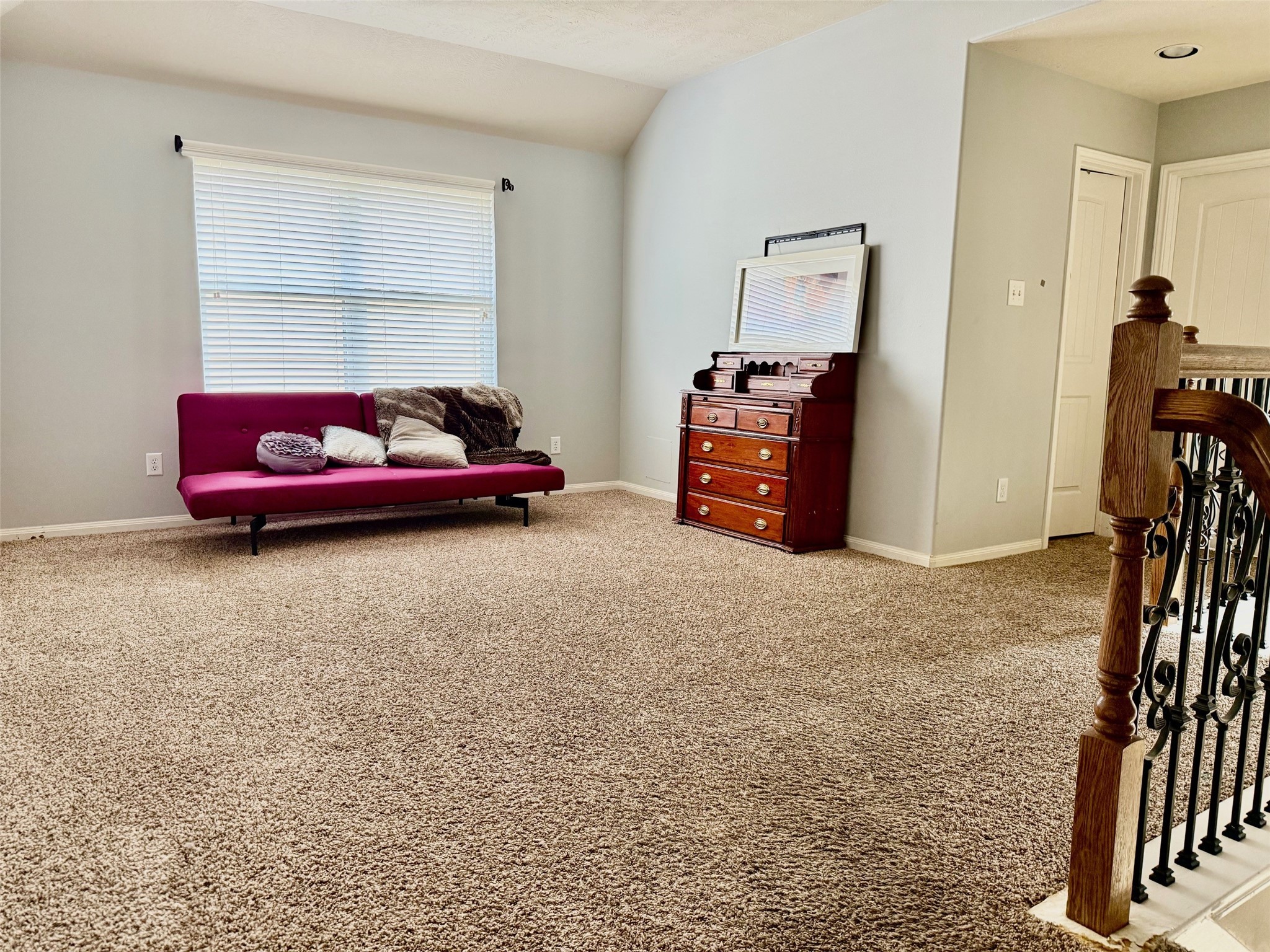 24906 Clover Ranch Drive Katy, TX 77494 - Photo 8 of 13 a living room with furniture and a flat screen tv