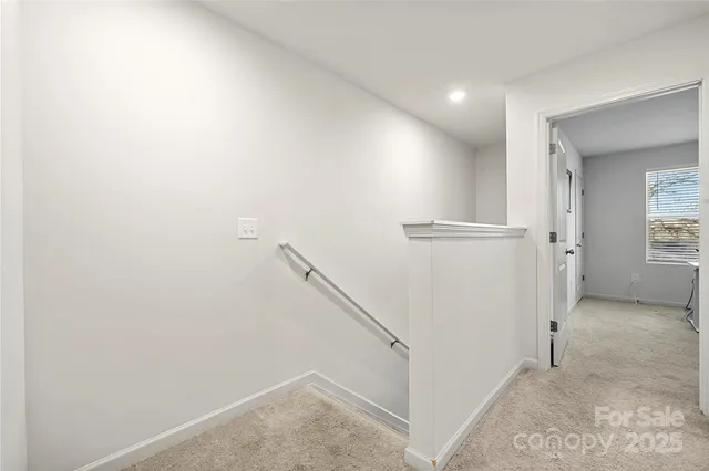 a view of hallway with stairs