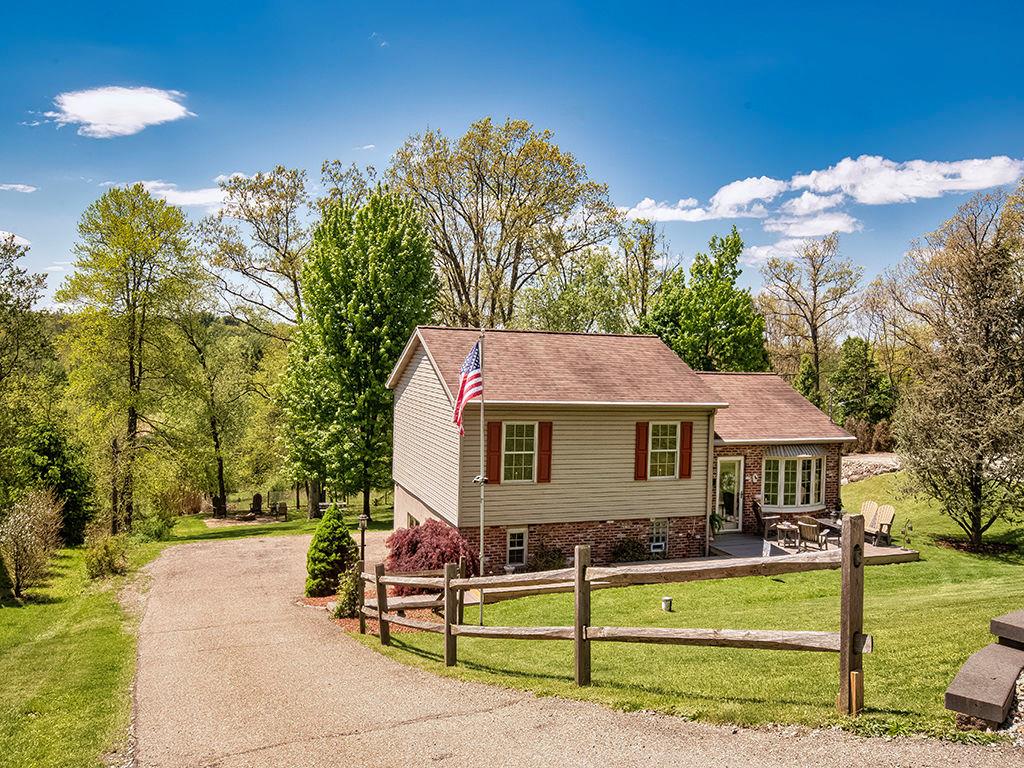 638 Knoll Lane Apollo, PA 15613 - Photo 28 of 30 a front view of a house with a yard