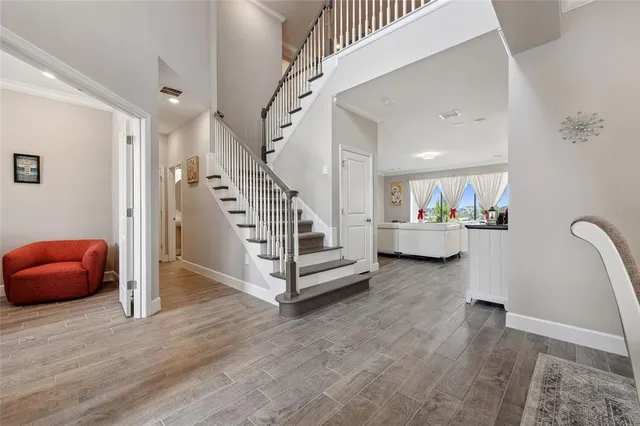 a view of livingroom with furniture and stairs