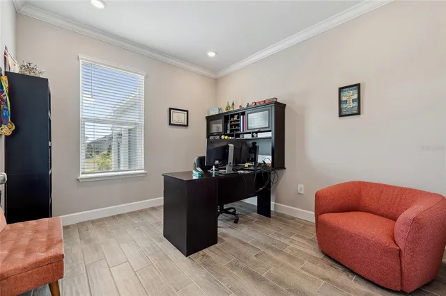 a workspace with furniture and window