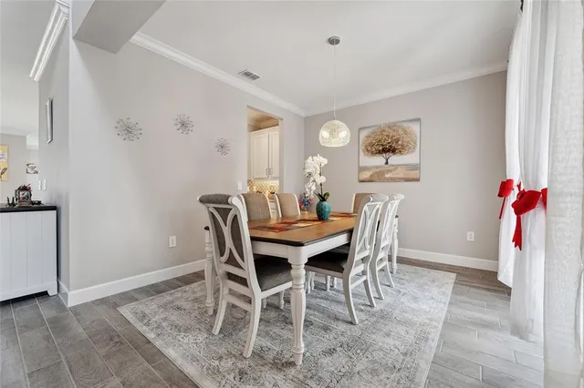 a view of a dining room with furniture