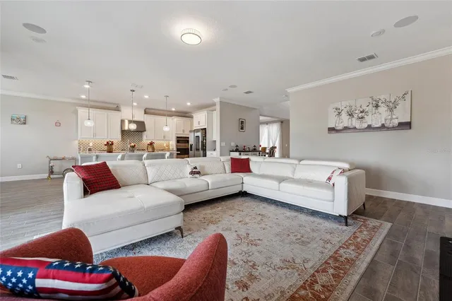 a living room with furniture and a couch