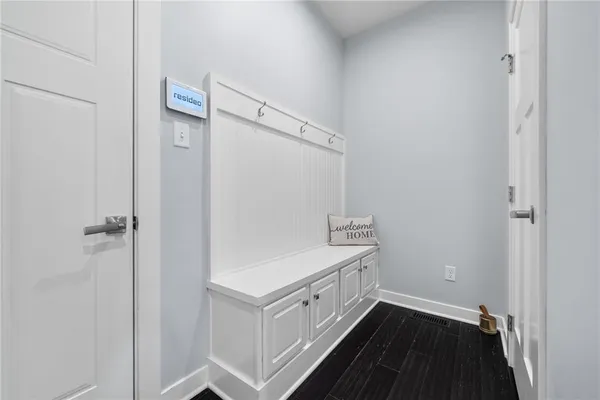 a view of a hallway with closet