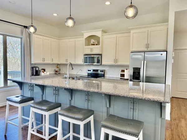 $695,000 | 13062 Yellow Pine Circle Northwest, Coon Rapids, MN 55448