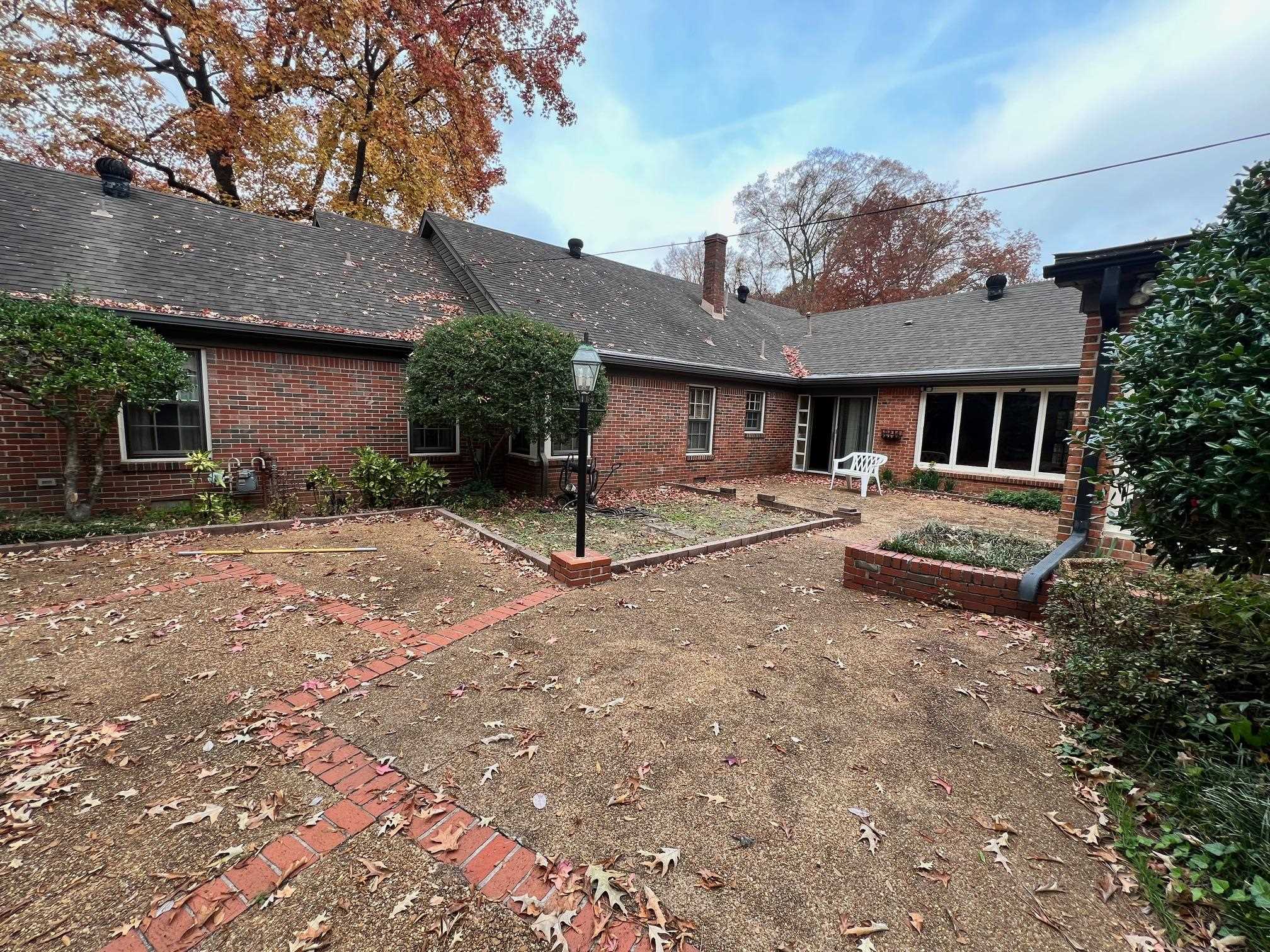 386 Roseland Place Memphis, TN 38111 - Photo 22 of 22 a front view of a house with garden