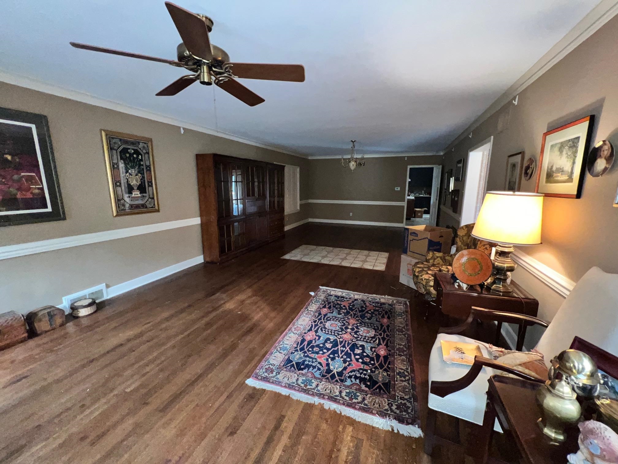 386 Roseland Place Memphis, TN 38111 - Photo 8 of 22 a living room with furniture and wooden floor