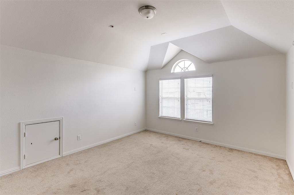 123 Quail Run Road Red Oak, TX 75154 - Photo 24 of 30 an empty room with a window and a mirror