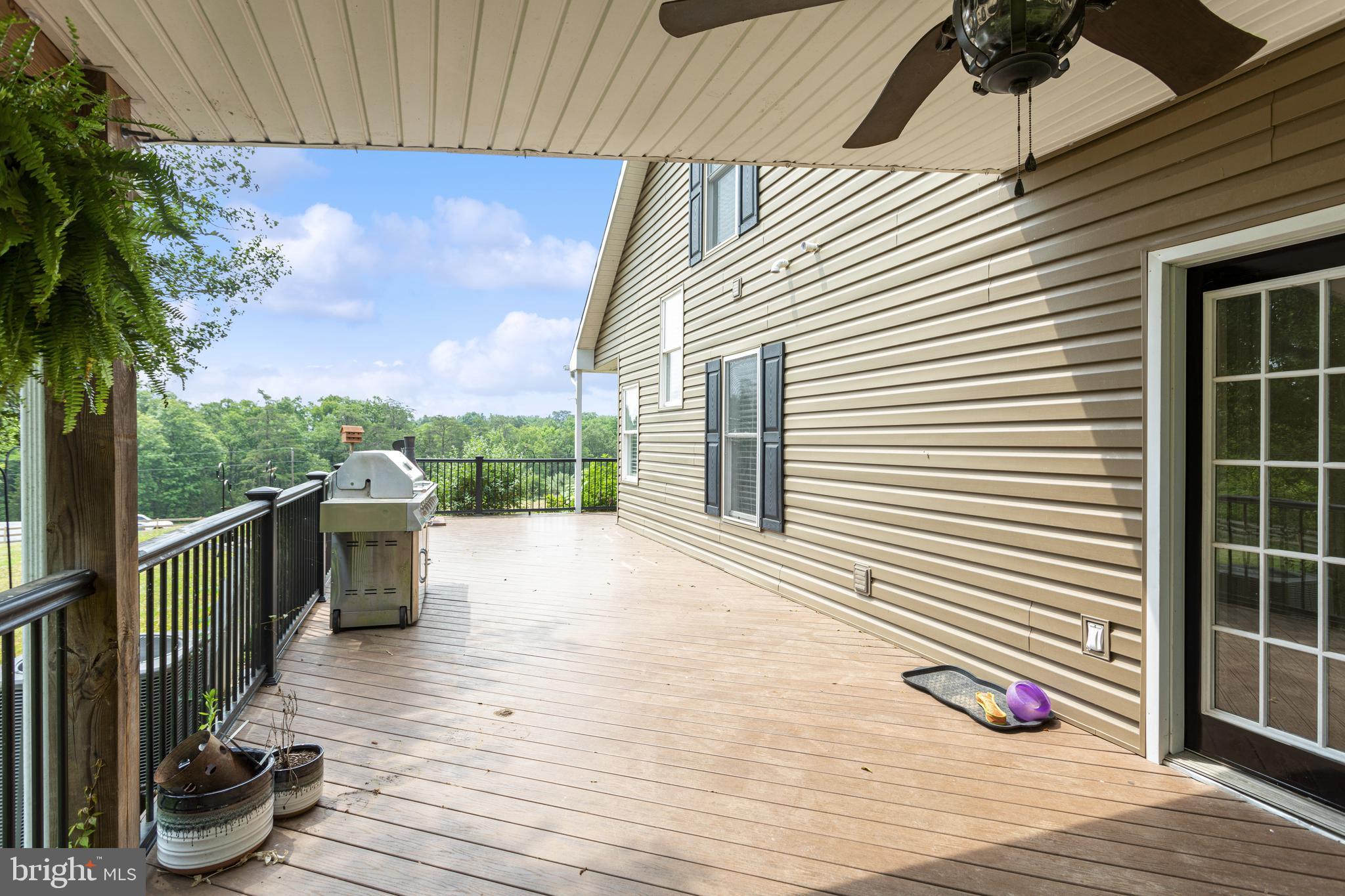 10330 Rogues Road Midland, VA 22728 - Photo 25 of 33 Wrap around deck overlooks the 2 acre property