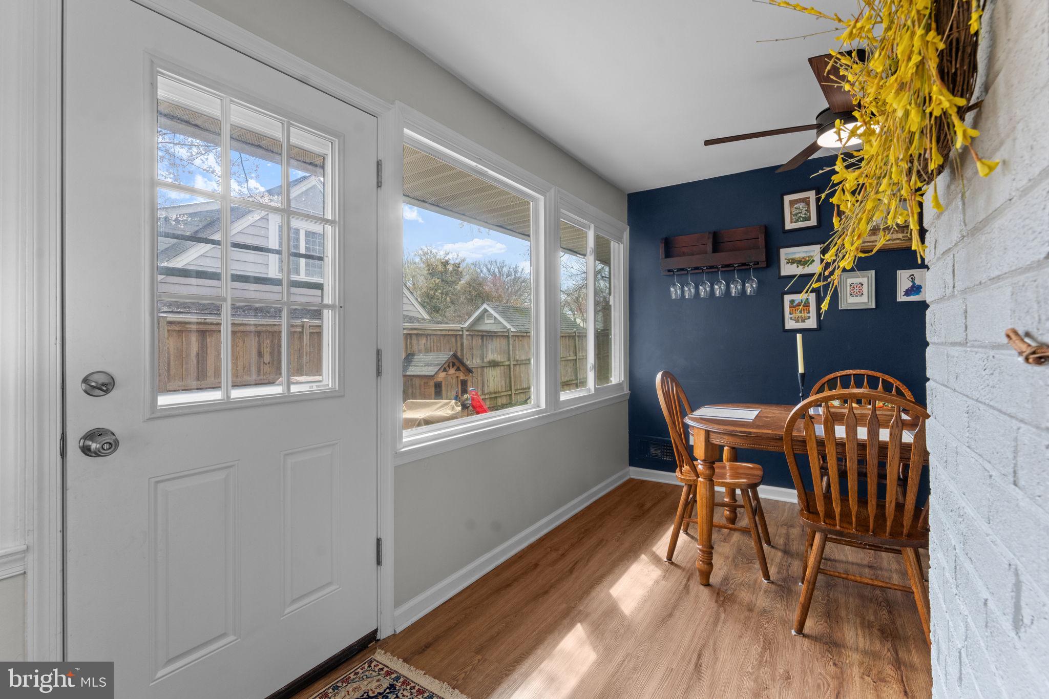 1806 Tilton Drive Silver Spring, MD 20902 - Photo 26 of 54 a view of a dining room with furniture and wooden floor