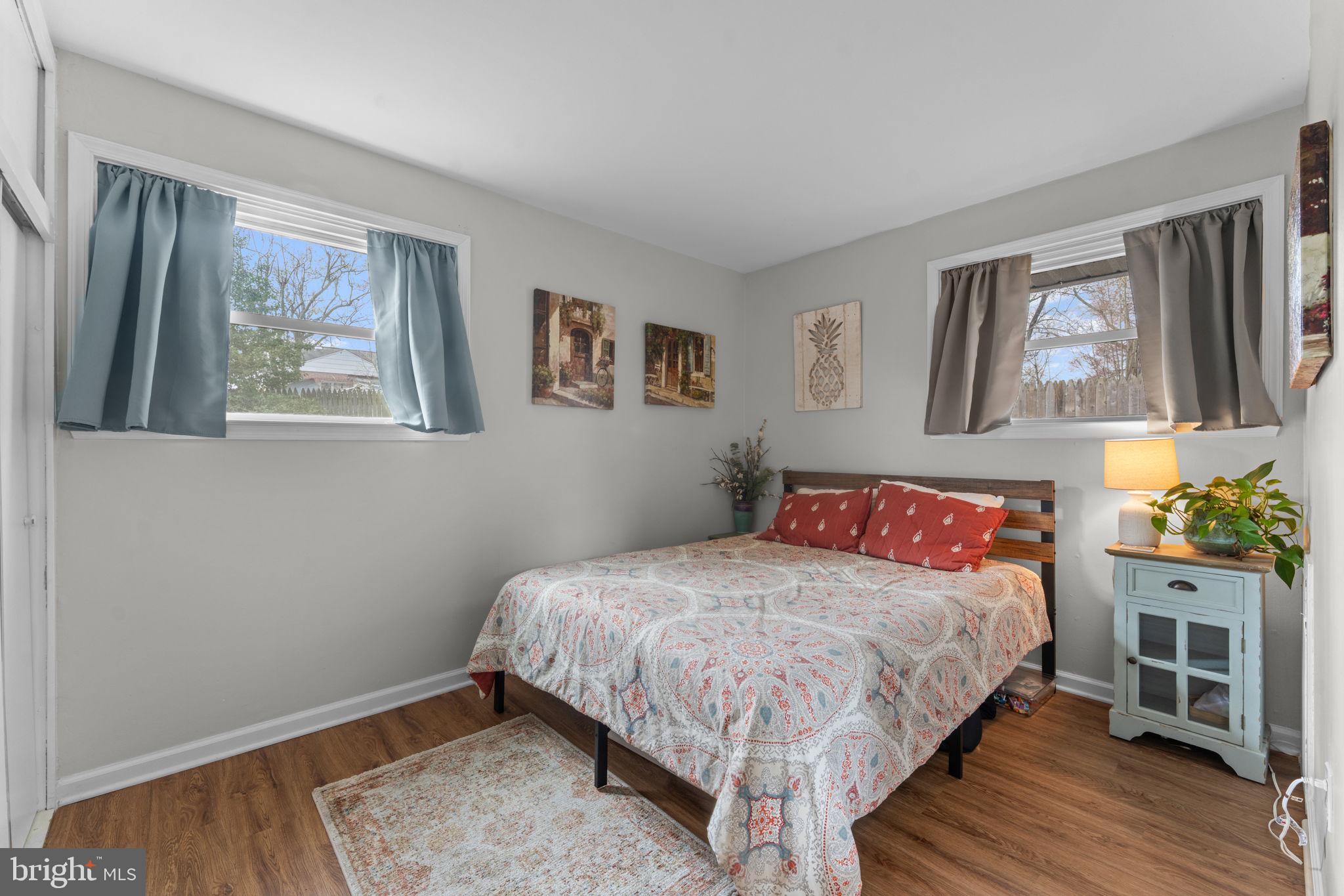 1806 Tilton Drive Silver Spring, MD 20902 - Photo 30 of 54 a bedroom with a bed and a window